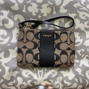 Coach zip wristlet. Brown signature print. Excellent used. Gold hardware